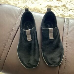 Ryka Black and Gray RYKA women’s Slip-On shows size 6 1/2